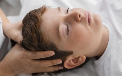 osteopathist-treating-boy-hospital